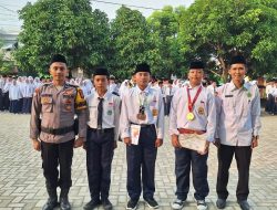 Bhabinkamtibmas Polsek Punggur Jadi Pembina Upacara, Tanamkan Disiplin dan Cegah Kenakalan Remaja di Sekolah